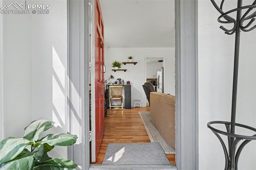 Image 4 of 28: View of exterior entry featuring stucco siding