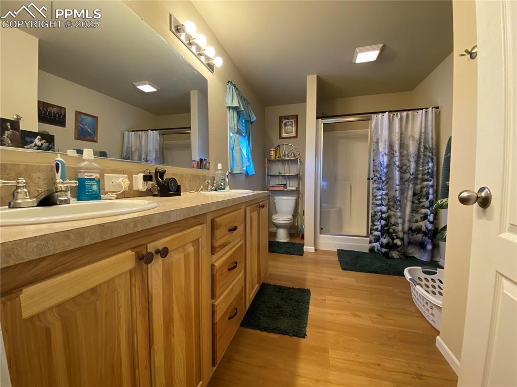 Image 10 of 48: And the master 3/4 bathroom provides extra storage