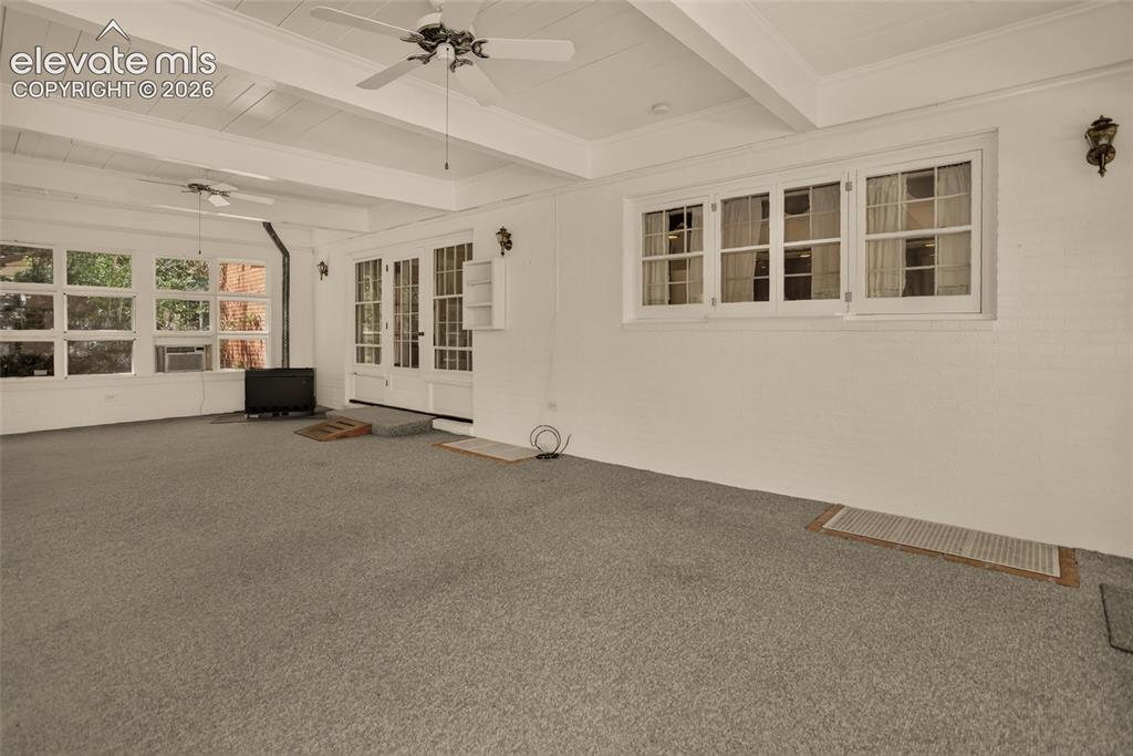 Image 16 of 49: Sunroom.