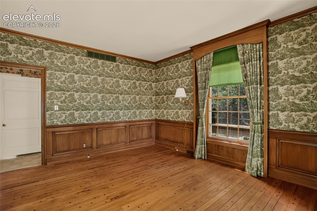 Image 30 of 49: 3rd bedroom and view of Jack & Jill bath.