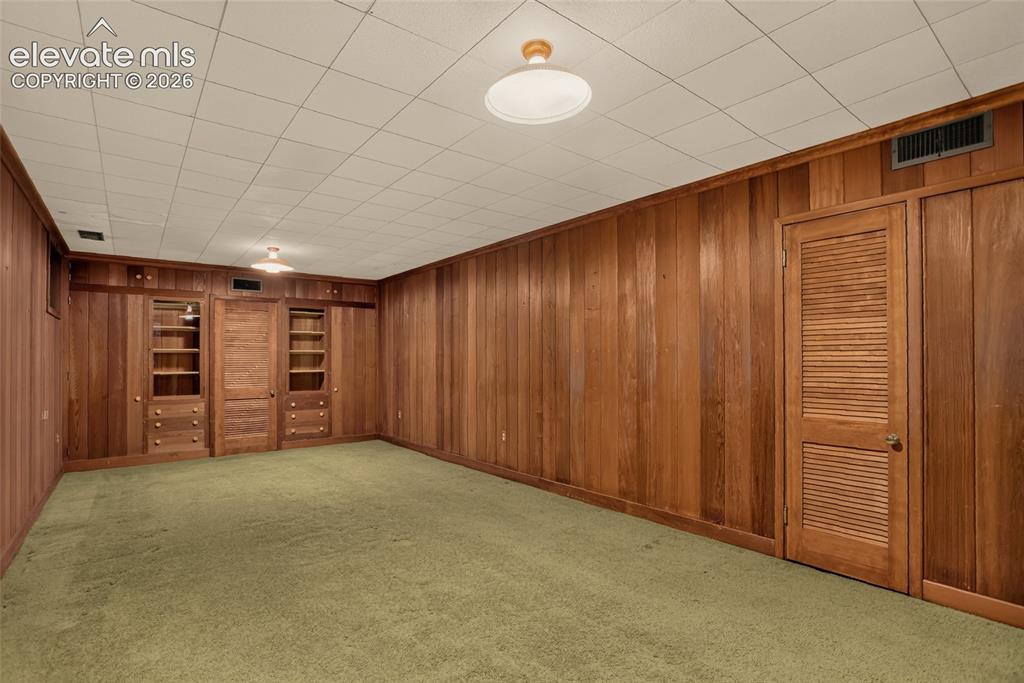 Image 40 of 49: Basement rec room.