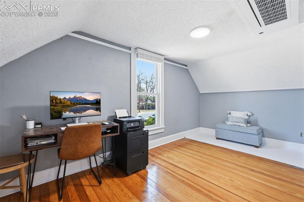 Image 21 of 50: The third bedroom is non-conforming, as it does not have a closet, but offe