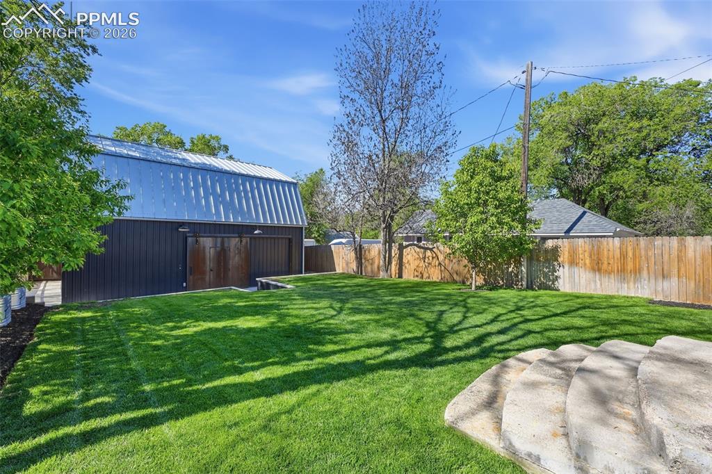 Image 27 of 50: The apartment has no windows facing the rear yard. This helps maintain priv