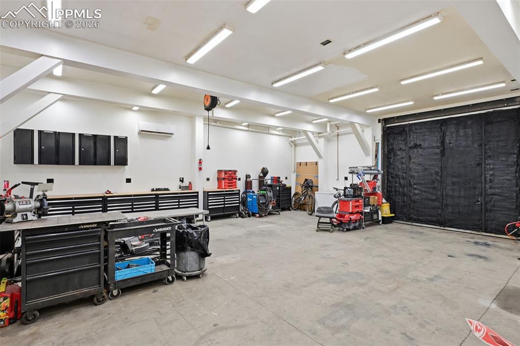 Image 31 of 50: 10ft, 8in ceilings and a 6" concrete slab floor.