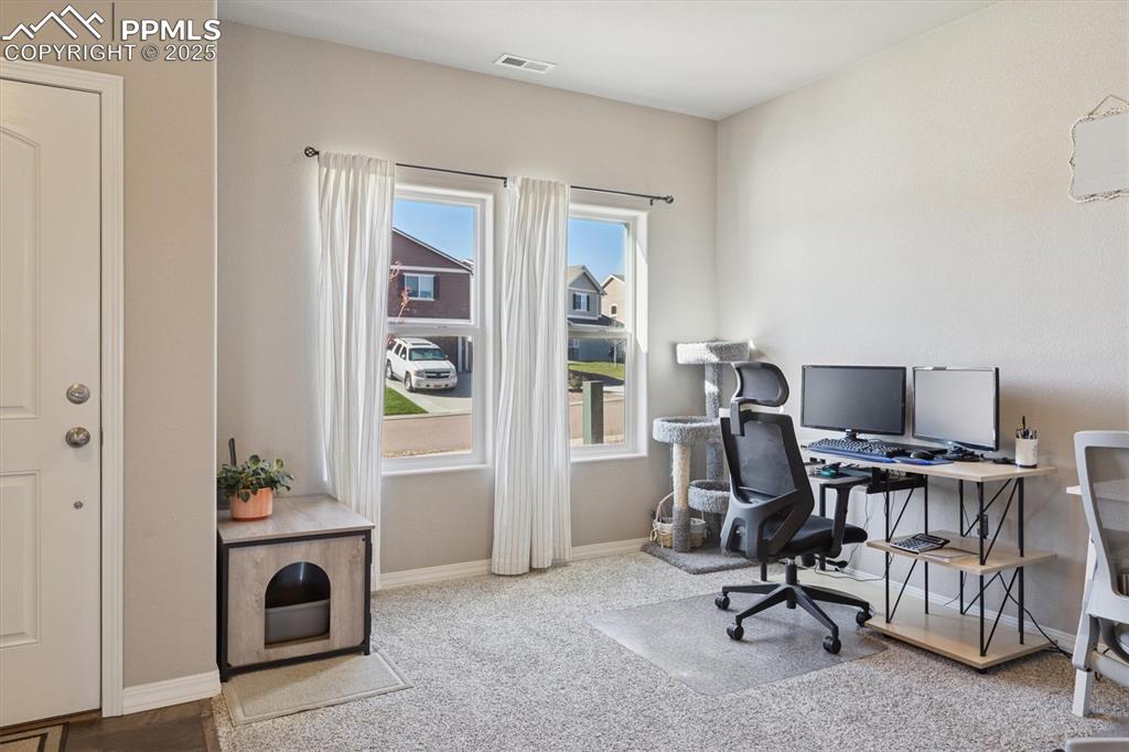 Image 11 of 45: Office with baseboards and light carpet