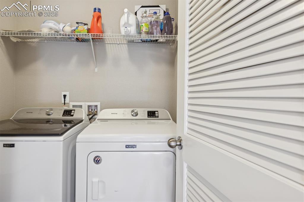 Image 42 of 45: Laundry room featuring washer and dryer