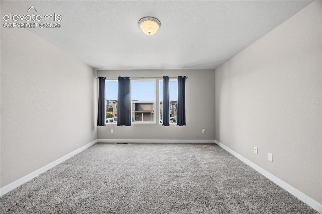Image 19 of 45: Upper Level Primary Bedroom.