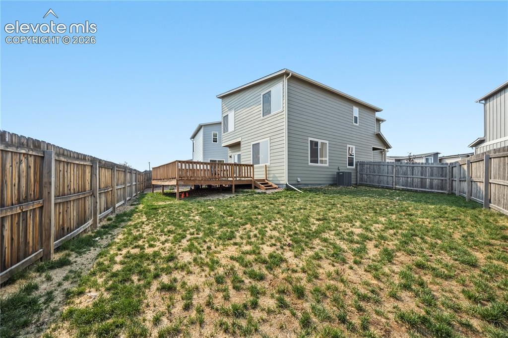 Image 36 of 45: Lots of room in the backyard for the kids and pets to play.
