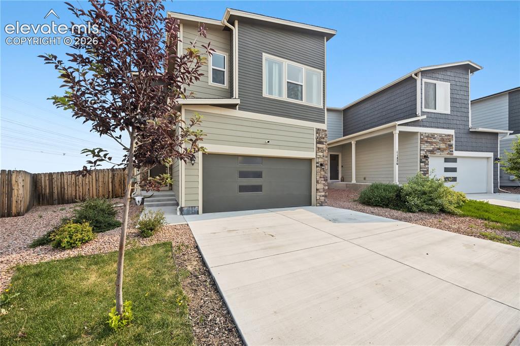 Image 4 of 45: Contemporary design with 2-car attached garage.