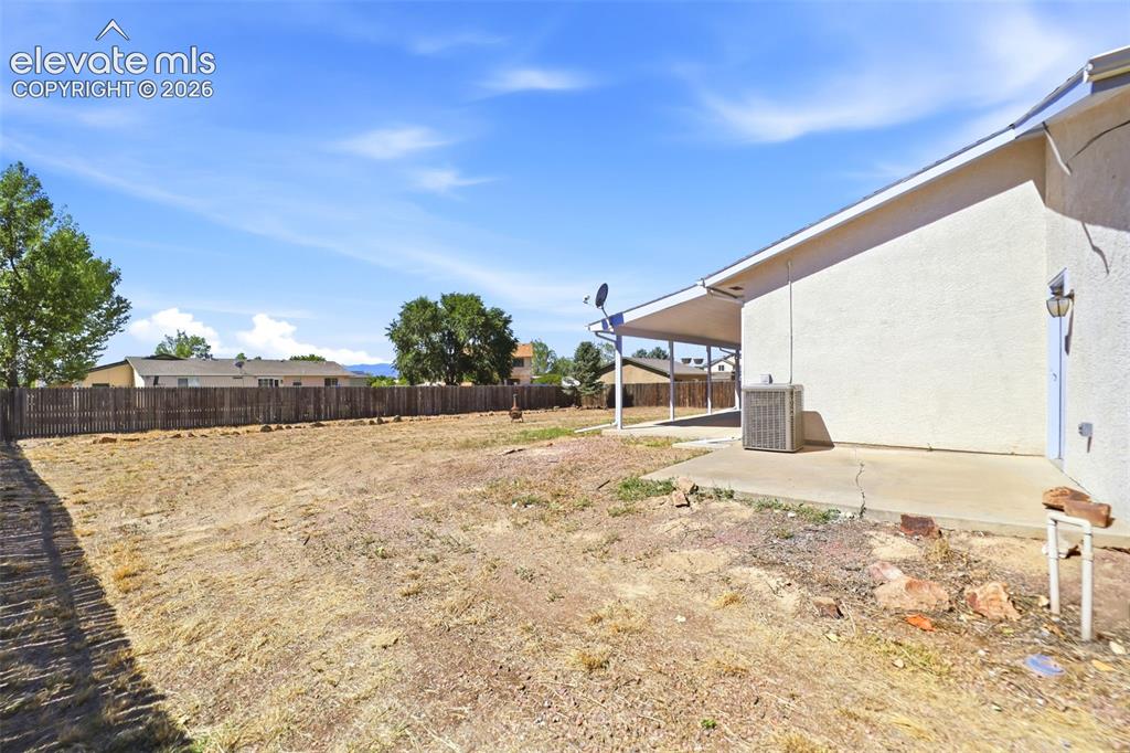 Image 40 of 46: Side Yard - The lot is 14,810 square feet.