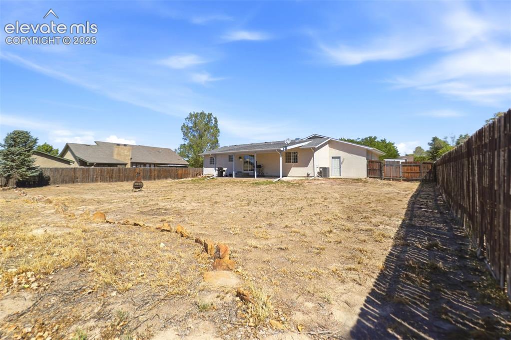 Image 41 of 46: Back Yard - The lot is 14,810 square feet.