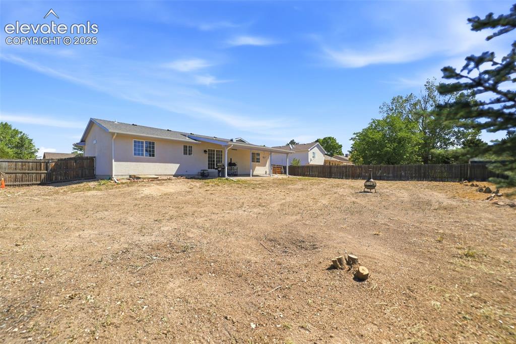 Image 42 of 46: Back Yard - The lot is 14,810 square feet.