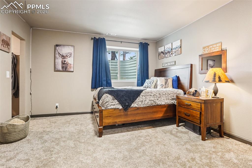 Image 28 of 49: Bedroom