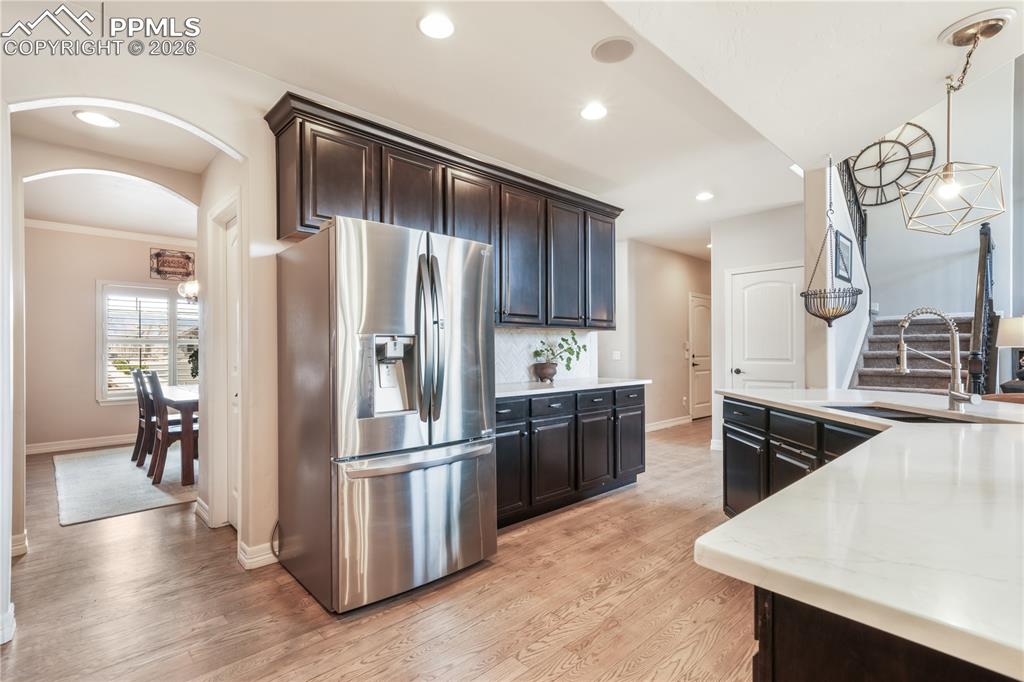Image 11 of 50: Formal dining area with views of Pikes Peak