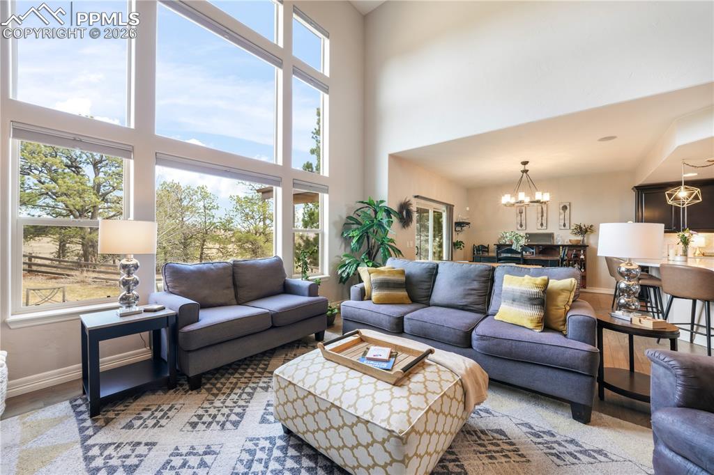 Image 17 of 50: Additional dining area with walk out access to the back patio