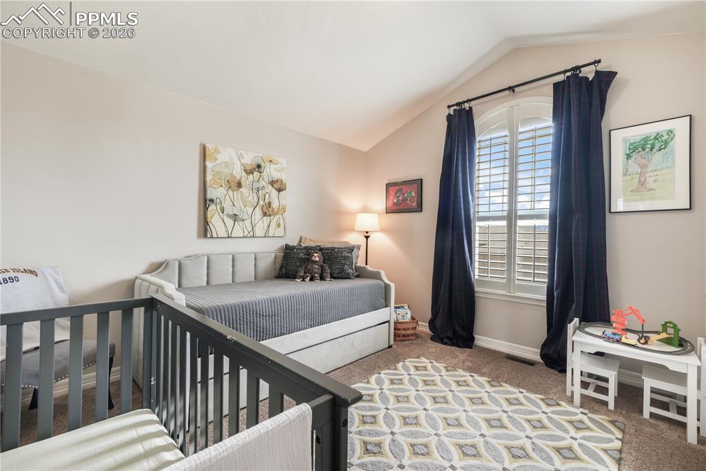 Image 30 of 50: Upper level primary 5  piece bath with dual vanities, large shower and larg