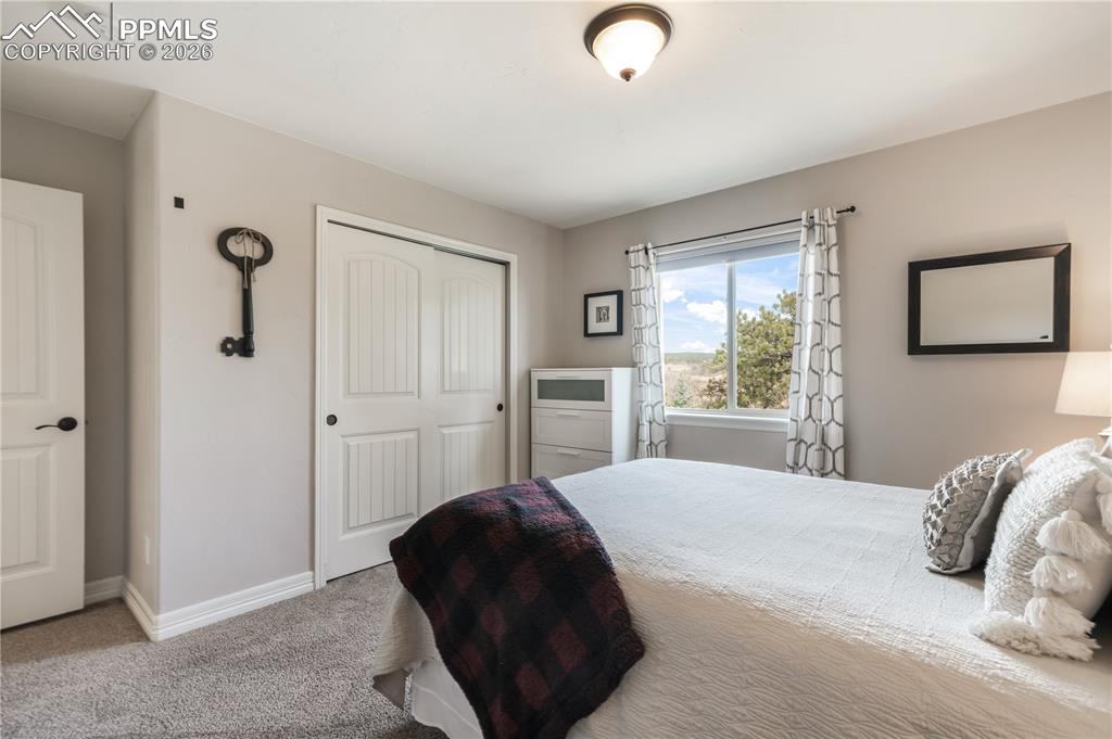 Image 34 of 50: Upper level 3rd bedroom