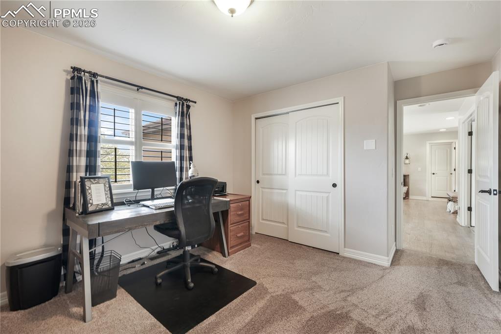 Image 35 of 50: Upstairs full bathroom with granite counters