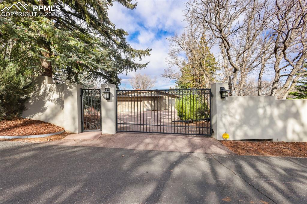 Image 4 of 50: Gated Driveway