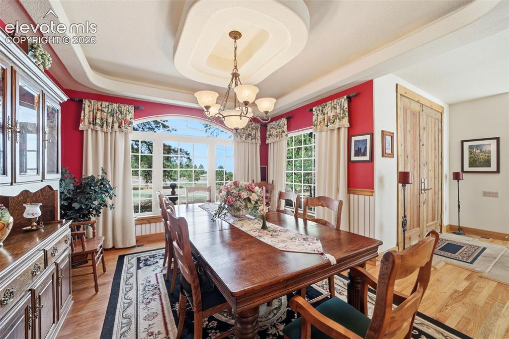 Image 20 of 50: Formal Dining Room is separate from an informal dining area