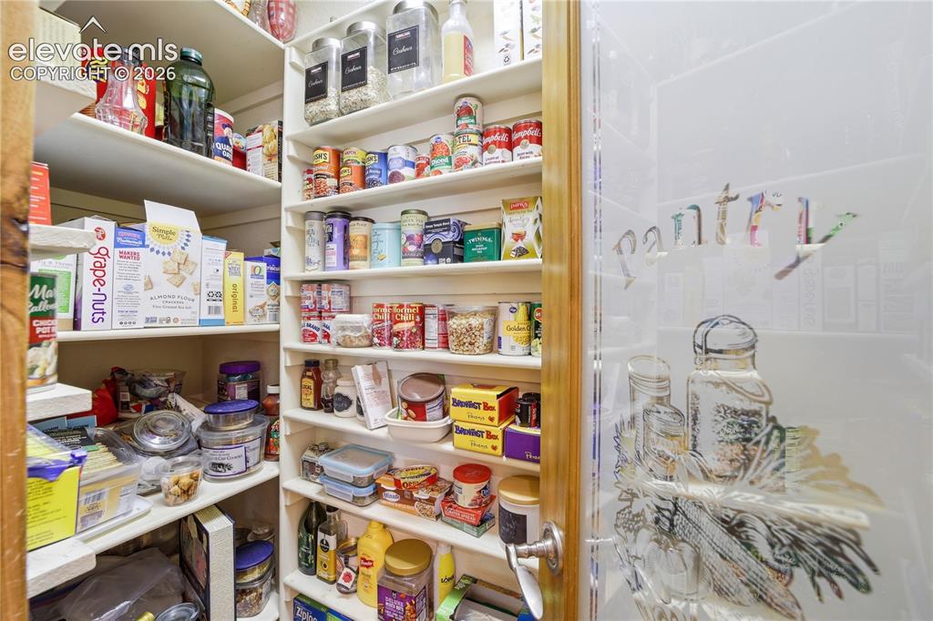 Image 27 of 50: Upgraded pantry with pull out cabinets