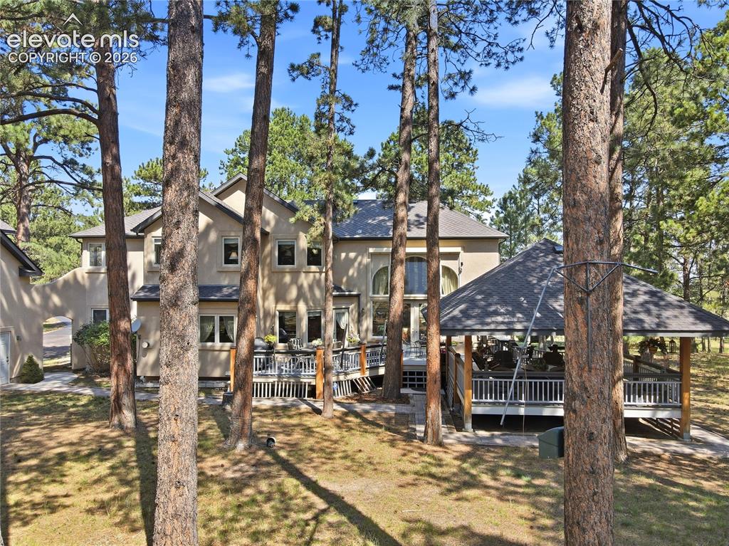 Image 3 of 50: Rear View wooded lot