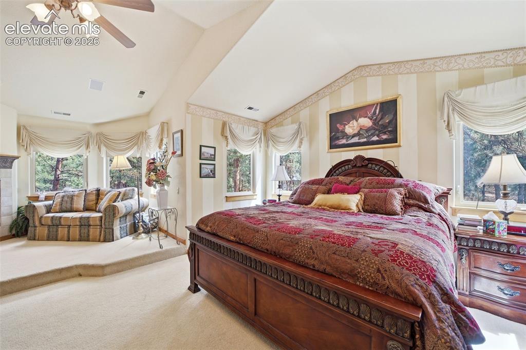 Image 37 of 50: Master Bedroom with bonus elevated seating area
