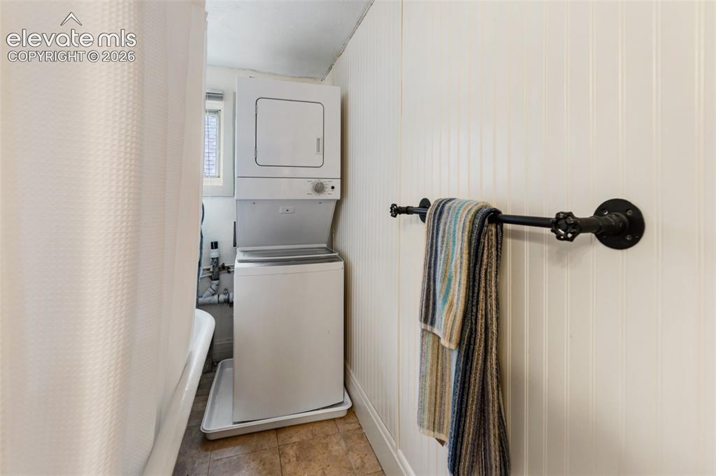 Image 22 of 27: stackable in bathroom