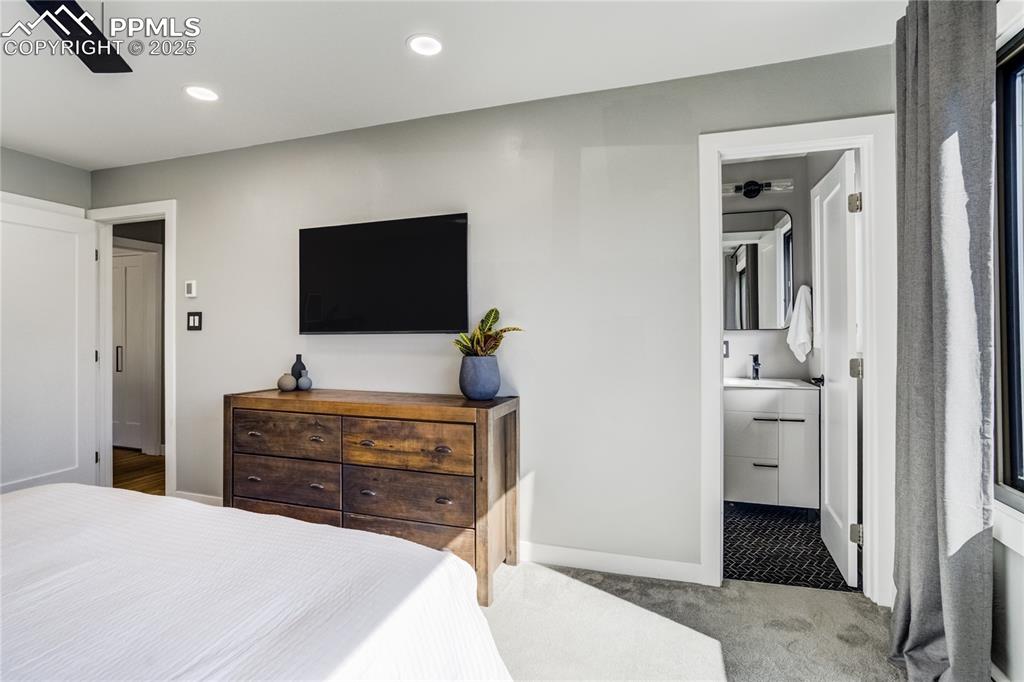 Image 25 of 46: Attached 3/4 primary bath