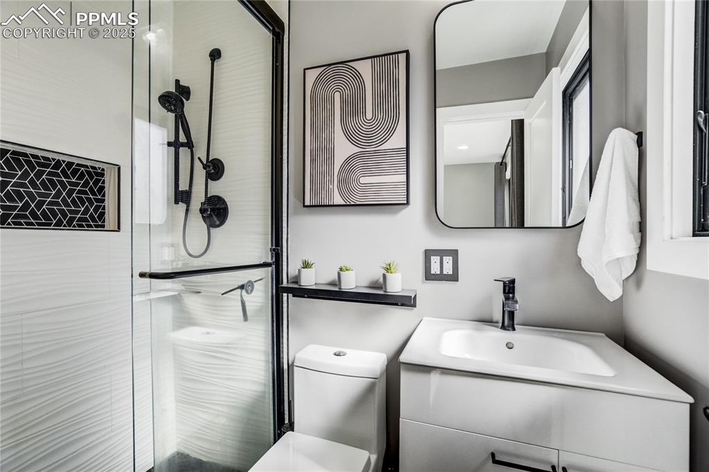 Image 26 of 46: Custom designed shower to primary bath