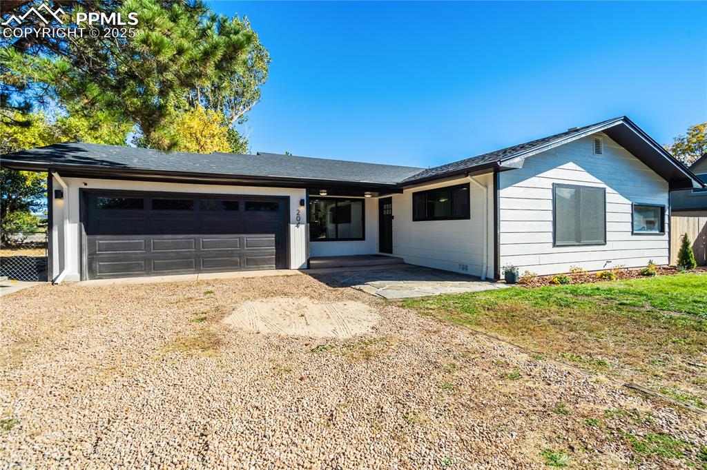 Image 3 of 46: Freshly painted exterior and BRAND NEW ROOF!