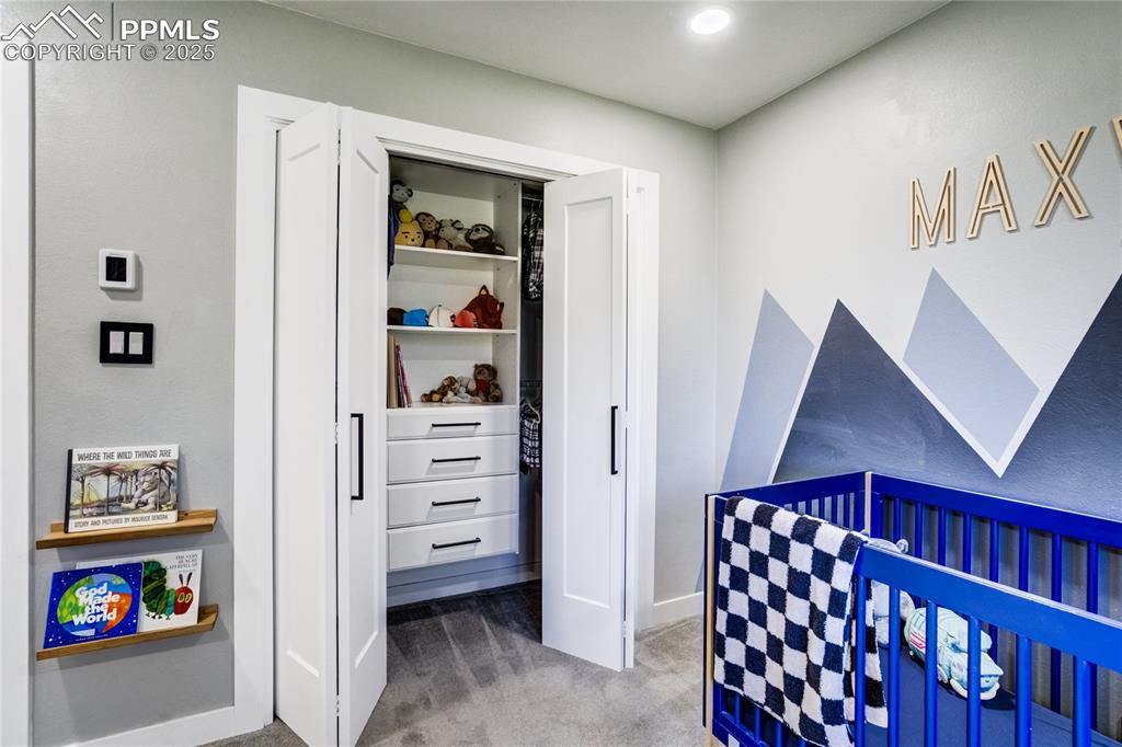 Image 30 of 46: Built-in closet system to Bedroom 1