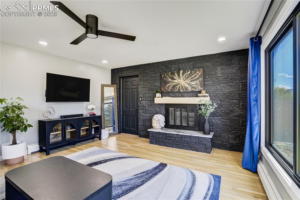 Image 7 of 46: Wood burning fireplace