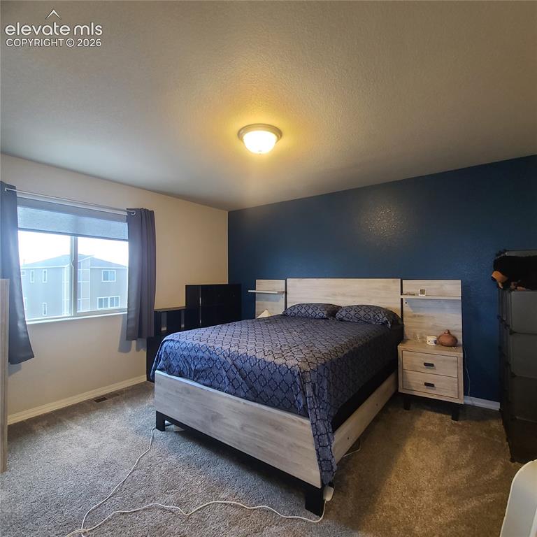 Image 10 of 34: Primary Bedroom