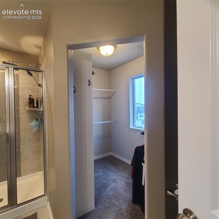 Image 14 of 34: Walk In Closet