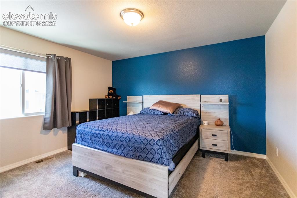 Image 16 of 36: Primary Suite