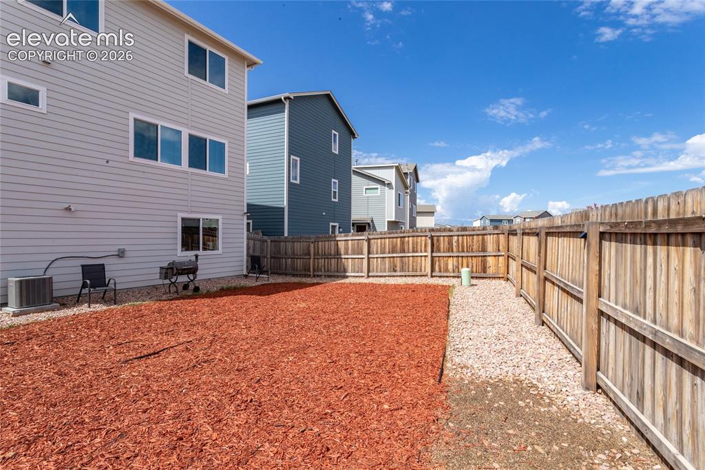 Image 32 of 36: Fenced yard for your pups