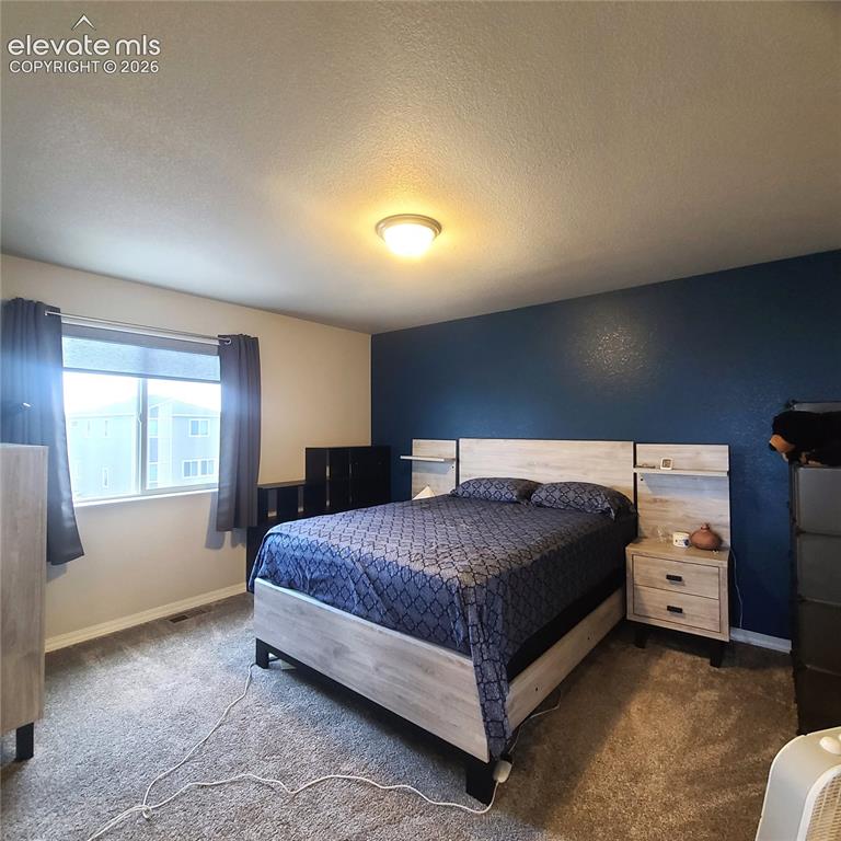 Image 9 of 34: Primary Bedroom