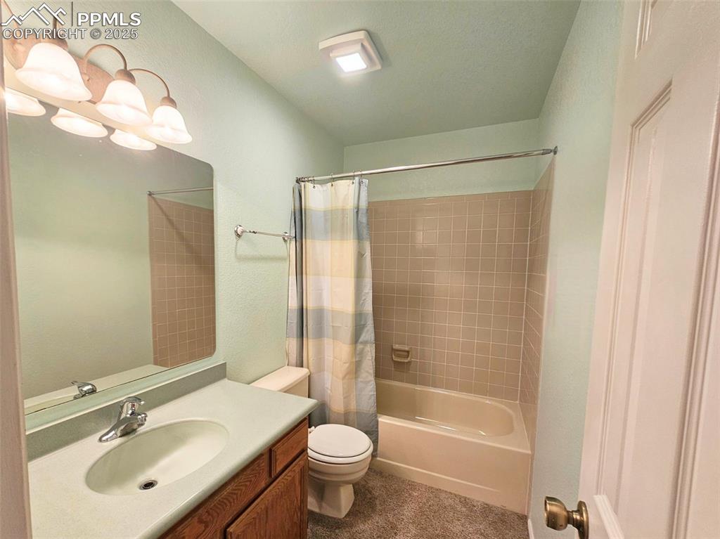 Image 16 of 36: 2nd bath next to 2nd bedroom
