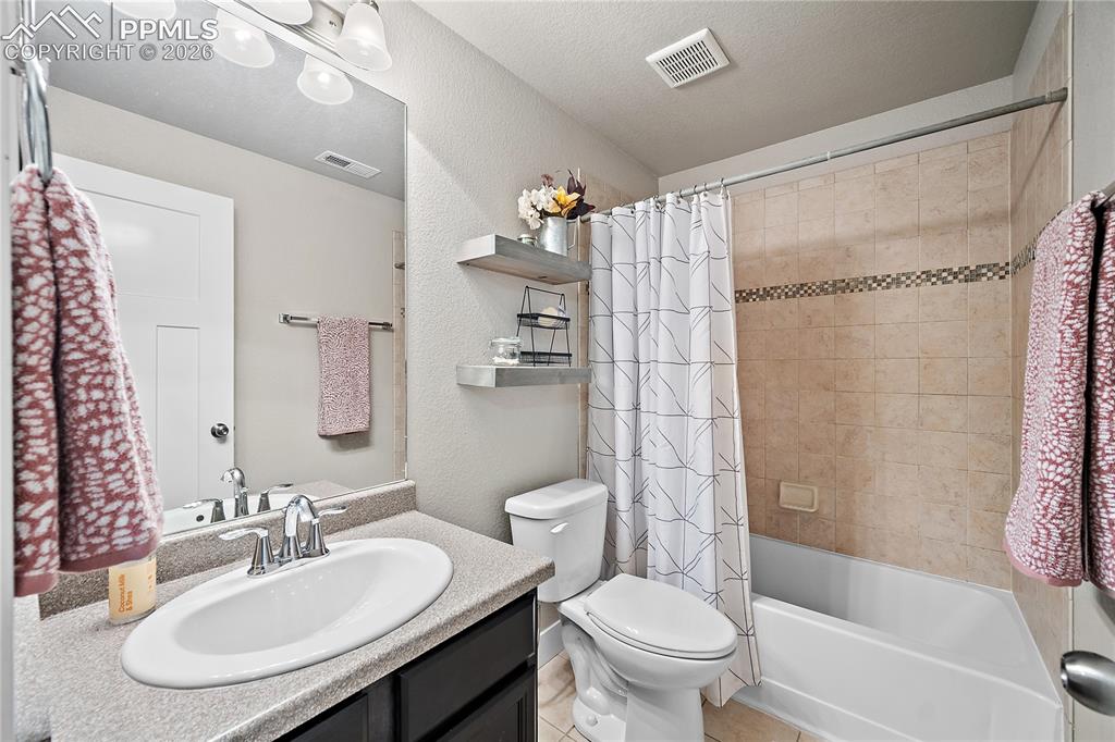 Image 28 of 44: Basement full bathroom