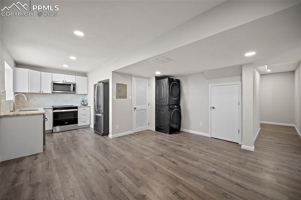 Image 25 of 50: 2nd Unit (Basement) Living Room