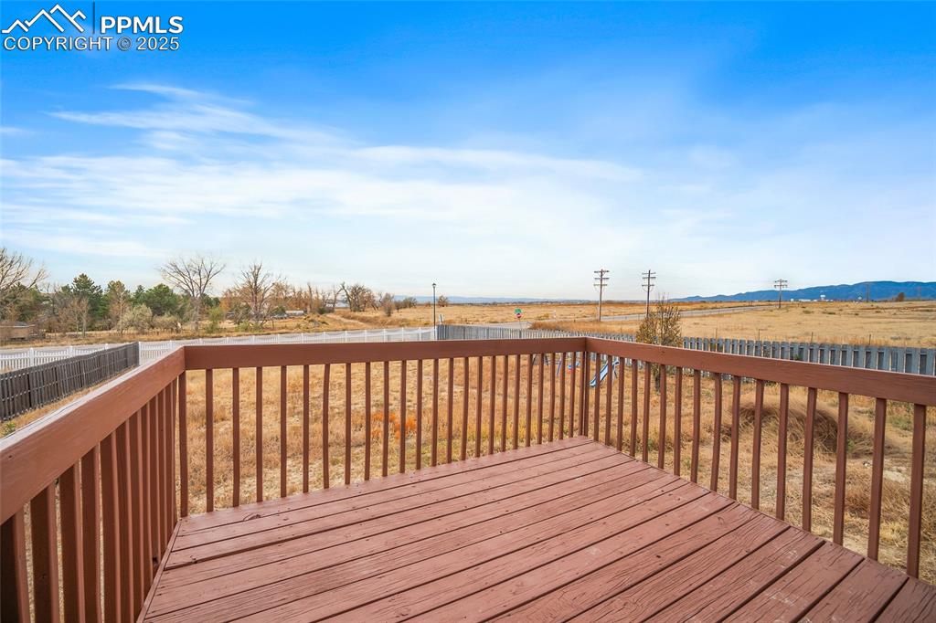Image 39 of 50: Beautiful Deck With Mountain Views