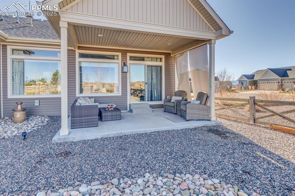 Image 40 of 50: View of patio featuring an outdoor living space