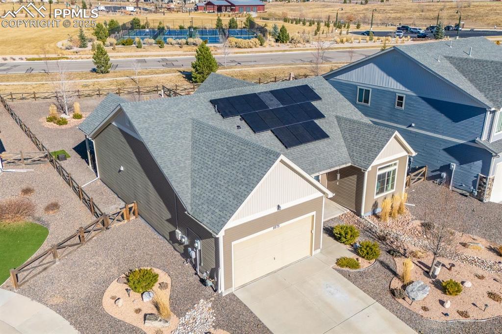 Image 48 of 50: Drone shot showing the manicured landscaping.