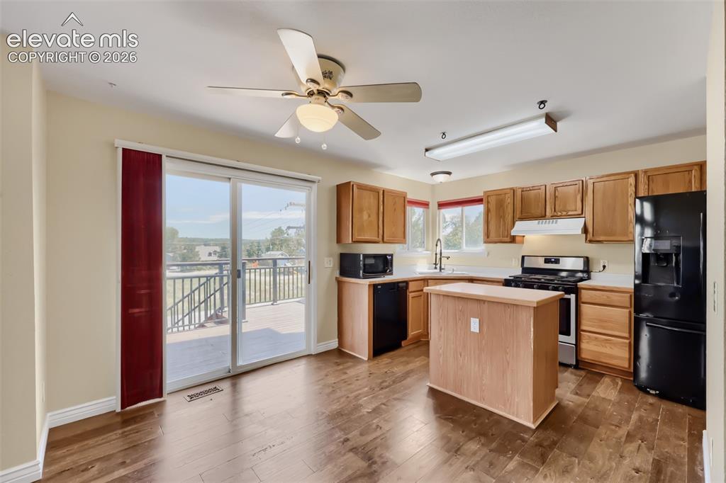 Image 8 of 27: Opens to back patio