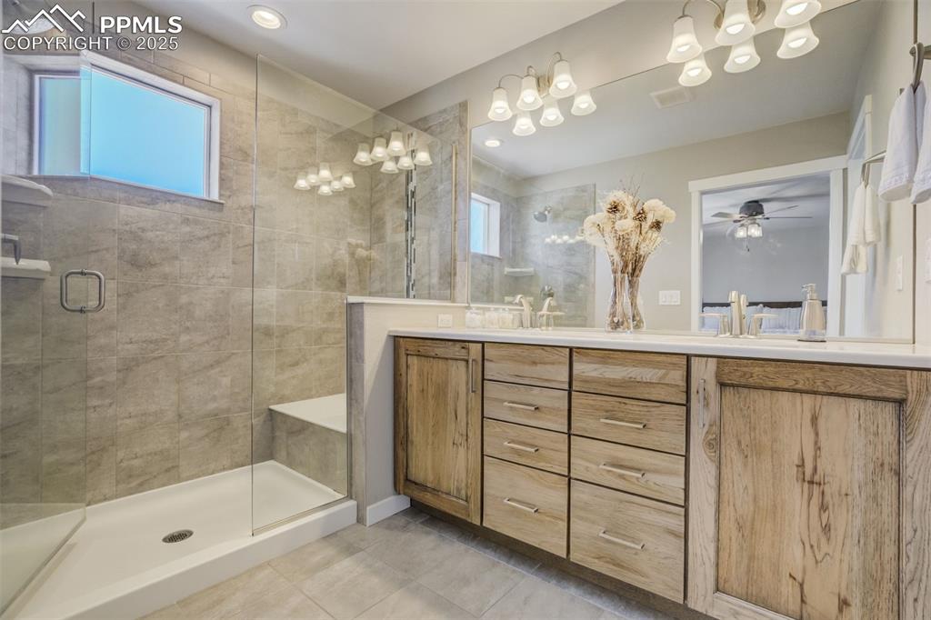 Image 26 of 45: on suite Primary Bathroom, dual sinks, walk in shower