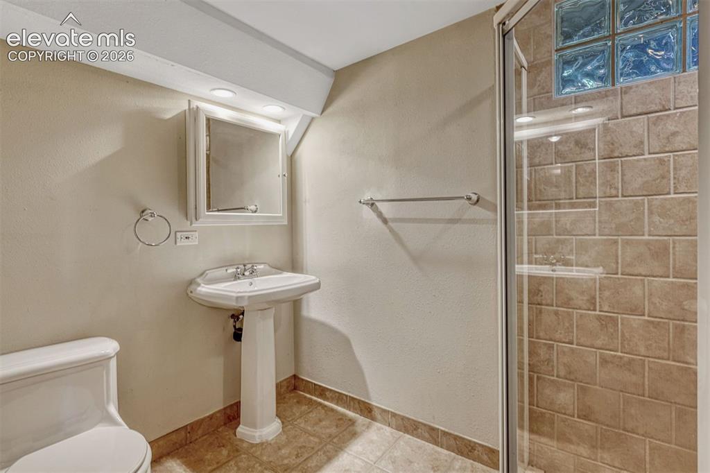 Image 15 of 33: Basement Bathroom