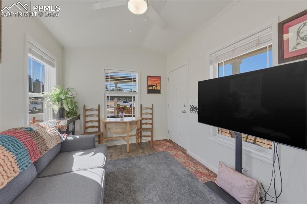 Image 10 of 23: Looking from kitchen toward front door