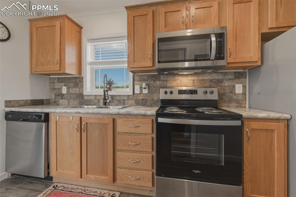 Image 13 of 23: Great counter space and another window offering views while doing clean-up
