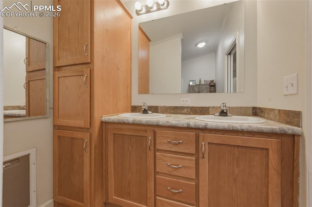 Image 17 of 23: another view of the spacious bathroom with great storage